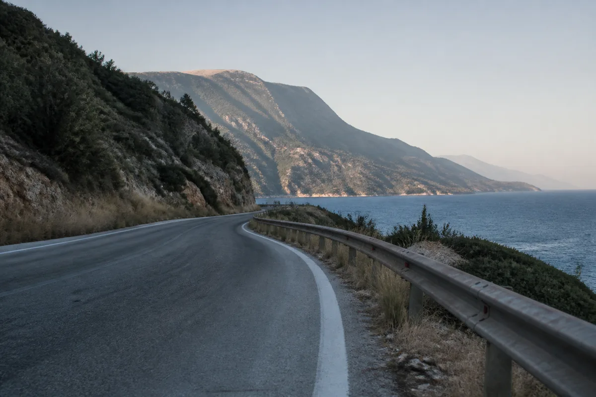 Greek coastal road illustrating the use of a road map to prepare a trip.